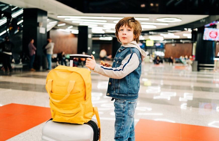 child-kid-boy-with-suitcase-and-backpack-in-airpor-2024-12-02-01-37-47-utc
