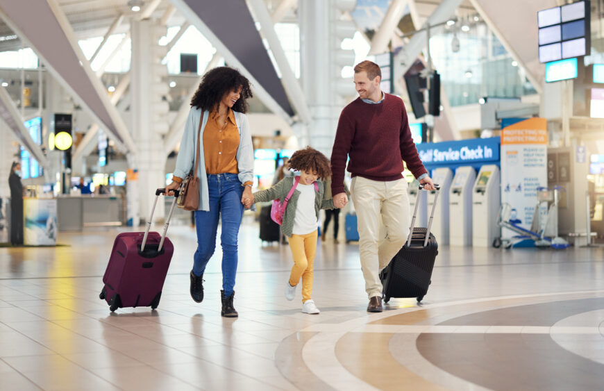 family-holding-hands-at-airport-and-travel-with-s-2025-04-06-04-55-16-utc
