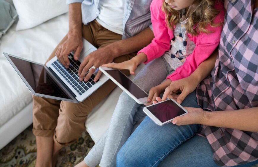 family-using-laptop-digital-tablet-and-mobile-pho-2025-04-03-03-50-24-utc
