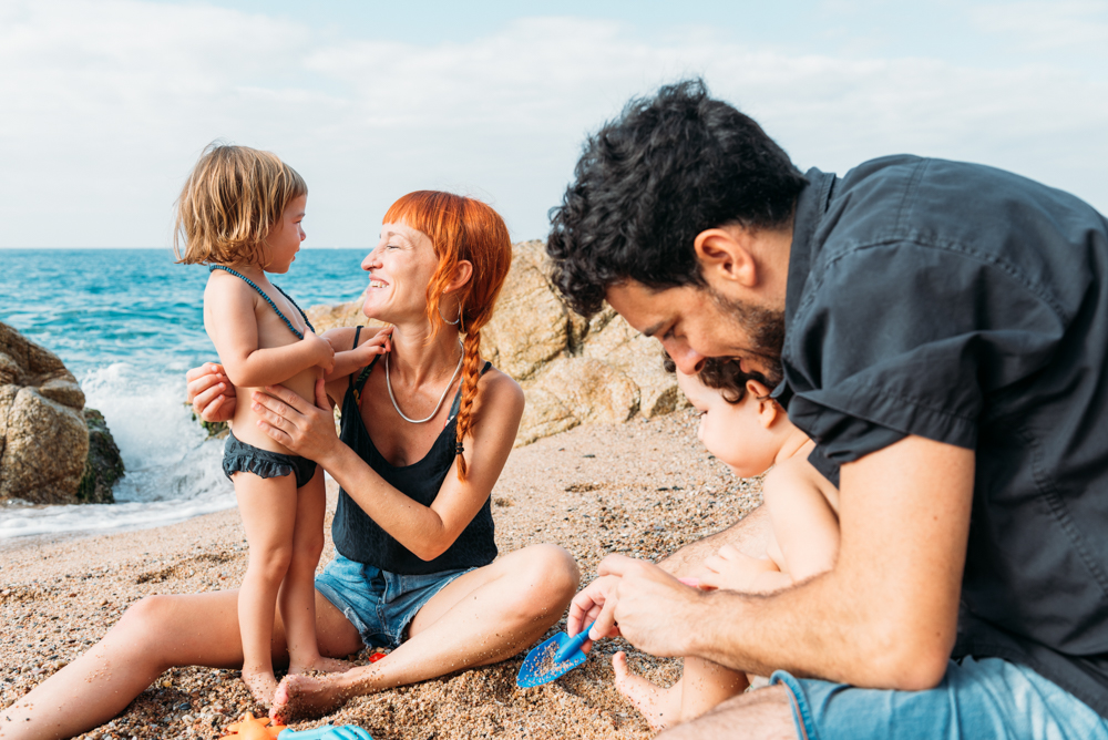 happy-family-playing-with-children-on-sandy-beach-2024-02-02-01-03-41-utc.webp