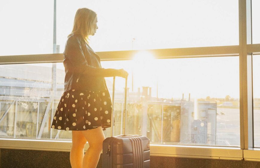 a-young-woman-waiting-to-board-at-the-airport-duri-2025-03-09-01-39-56-utc