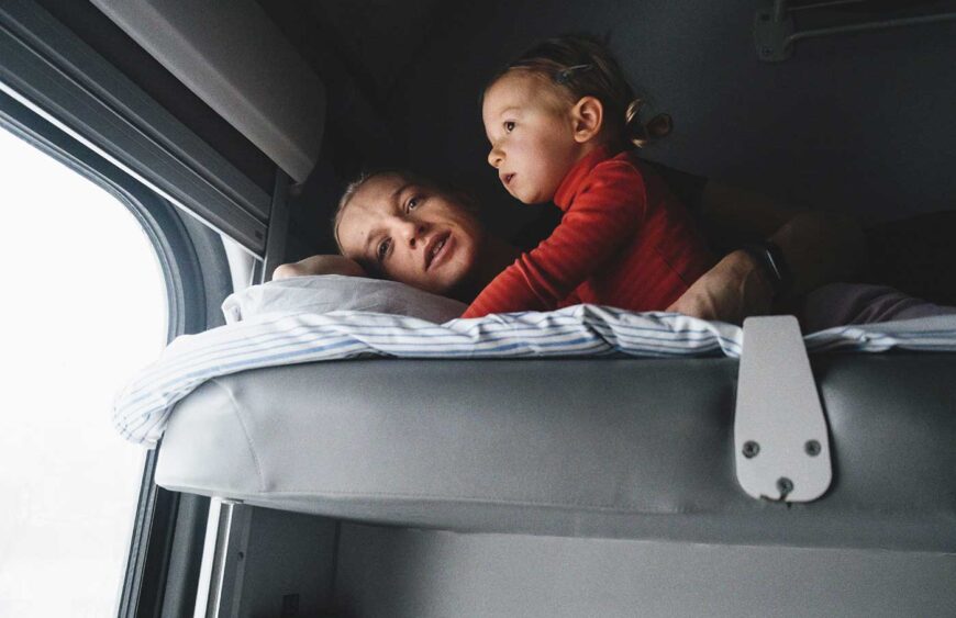 father-with-child-travalling-in-train-having-fun-2025-03-08-04-34-19-utc
