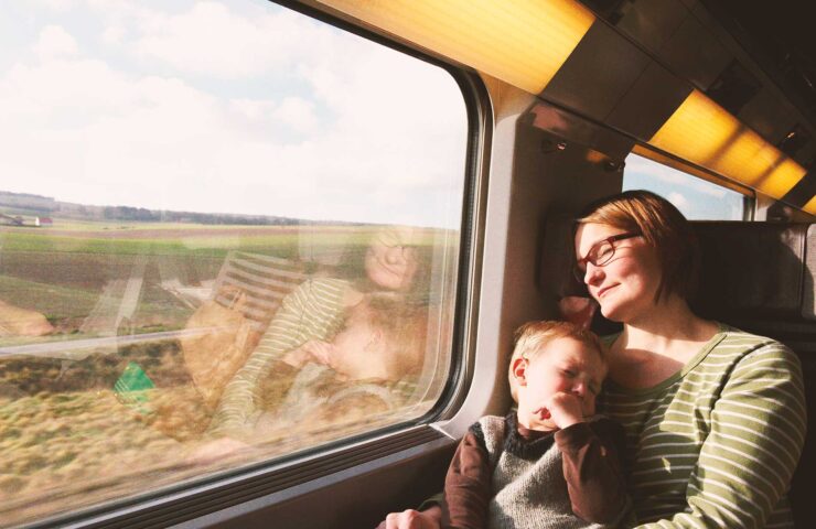 mother-and-son-asleep-on-train-2024-10-18-14-38-03-utc