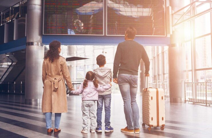 rear-view-of-family-with-two-little-kids-looking-a-2025-02-22-08-36-11-utc