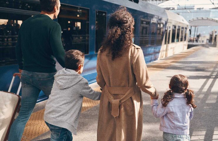 rear-view-of-family-with-two-little-kids-walking-b-2025-02-22-07-20-46-utc