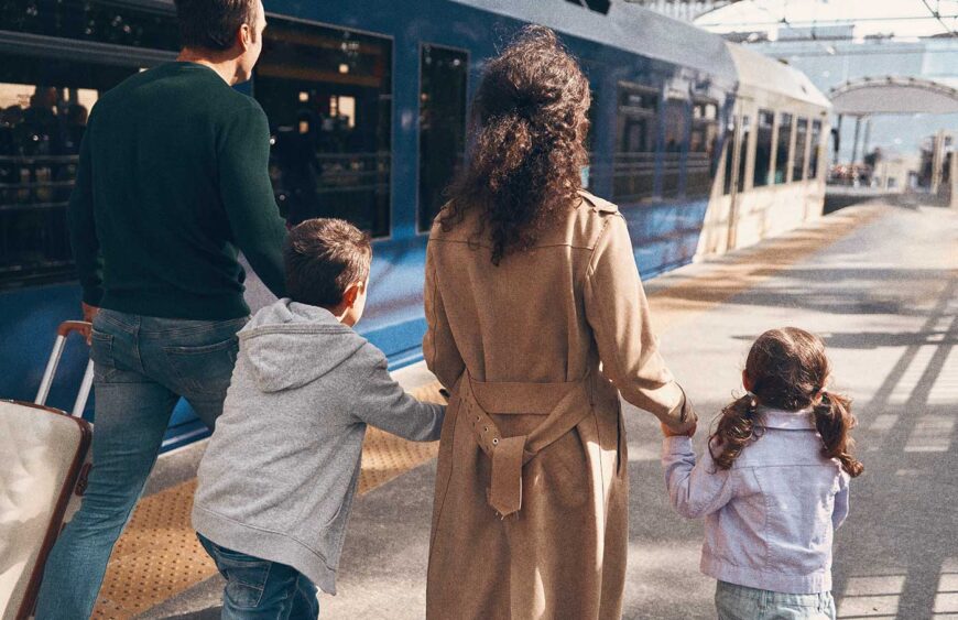 rear-view-of-family-with-two-little-kids-walking-b-2025-02-22-07-20-46-utc