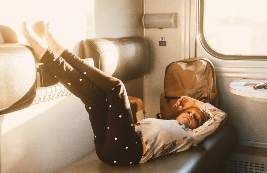 tired-child-riding-in-train-family-travel-2025-03-08-13-42-07-utc