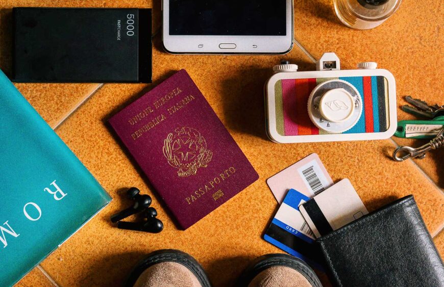 travel-flatlay-with-italian-passport-colorful-lom-2024-12-02-22-32-52-utc