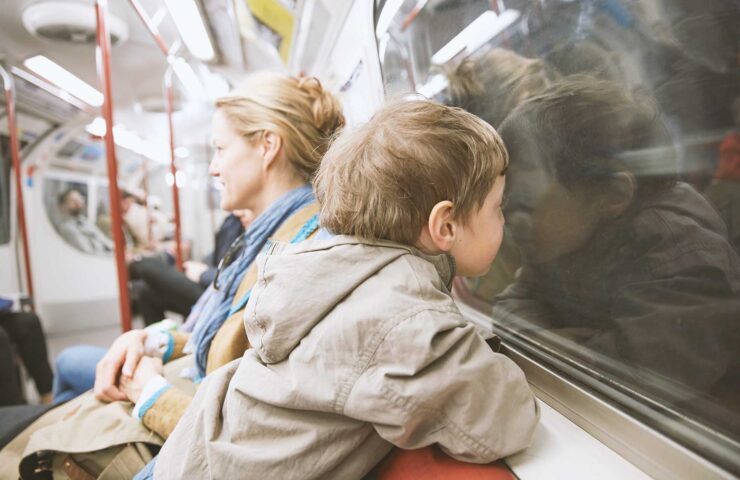 boy-in-tube-train-carriage-face-against-window-2024-11-03-03-47-16-utc
