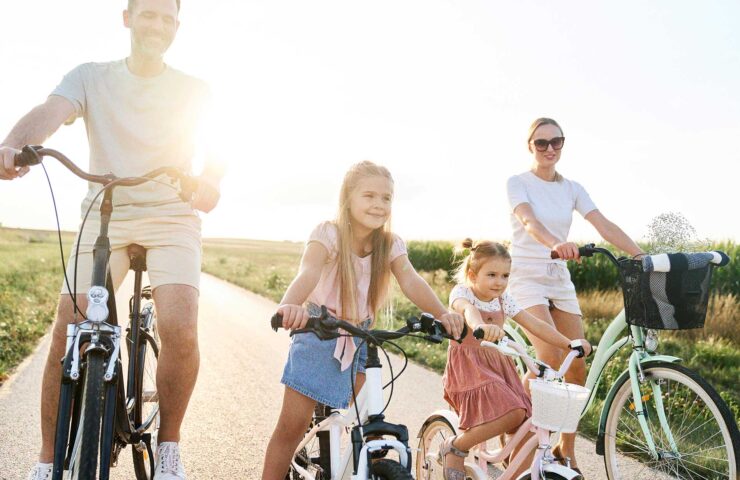 family-of-four-caucasian-people-riding-bikes-on-vi-2024-11-26-18-45-06-utc