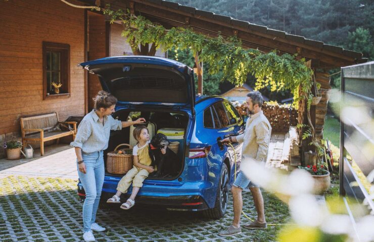 father-charging-their-electric-car-little-daughte-2024-10-21-17-59-13-utc