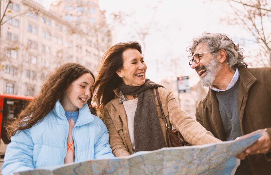happy-family-reading-a-map-while-visiting-a-city-c-2025-09-14-17-31-30-utc
