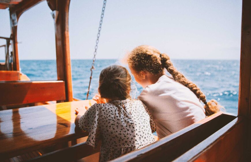 two-sisters-on-the-deck-of-a-yacht-boat-trip-2025-01-09-17-58-44-utc