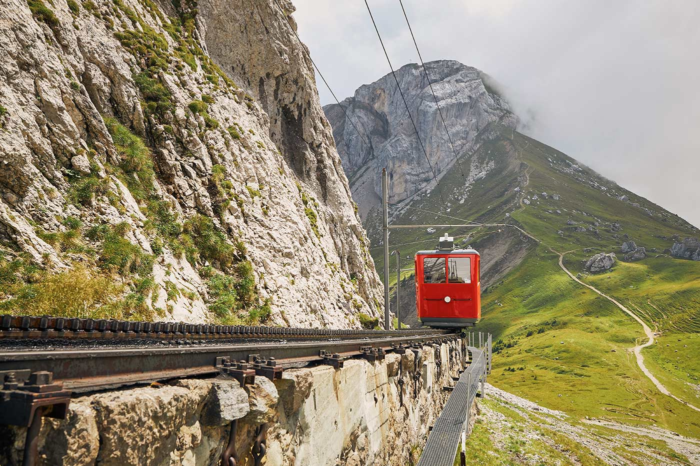 cogwheel-train-passing-mountain-landscape-of-swiss-2025-02-16-09-40-57-utc