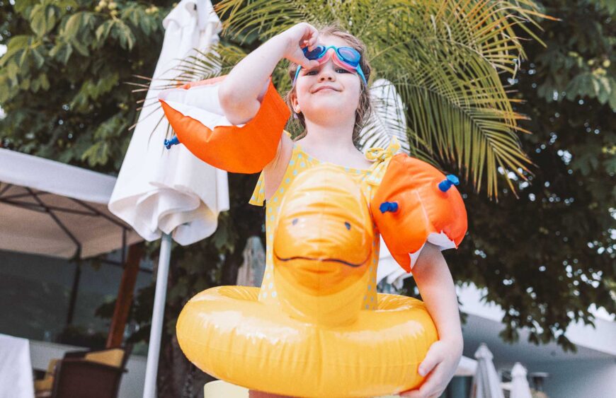 little-cute-girl-in-goggles-and-yellow-swimsuit-is-2025-01-09-05-16-23-utc