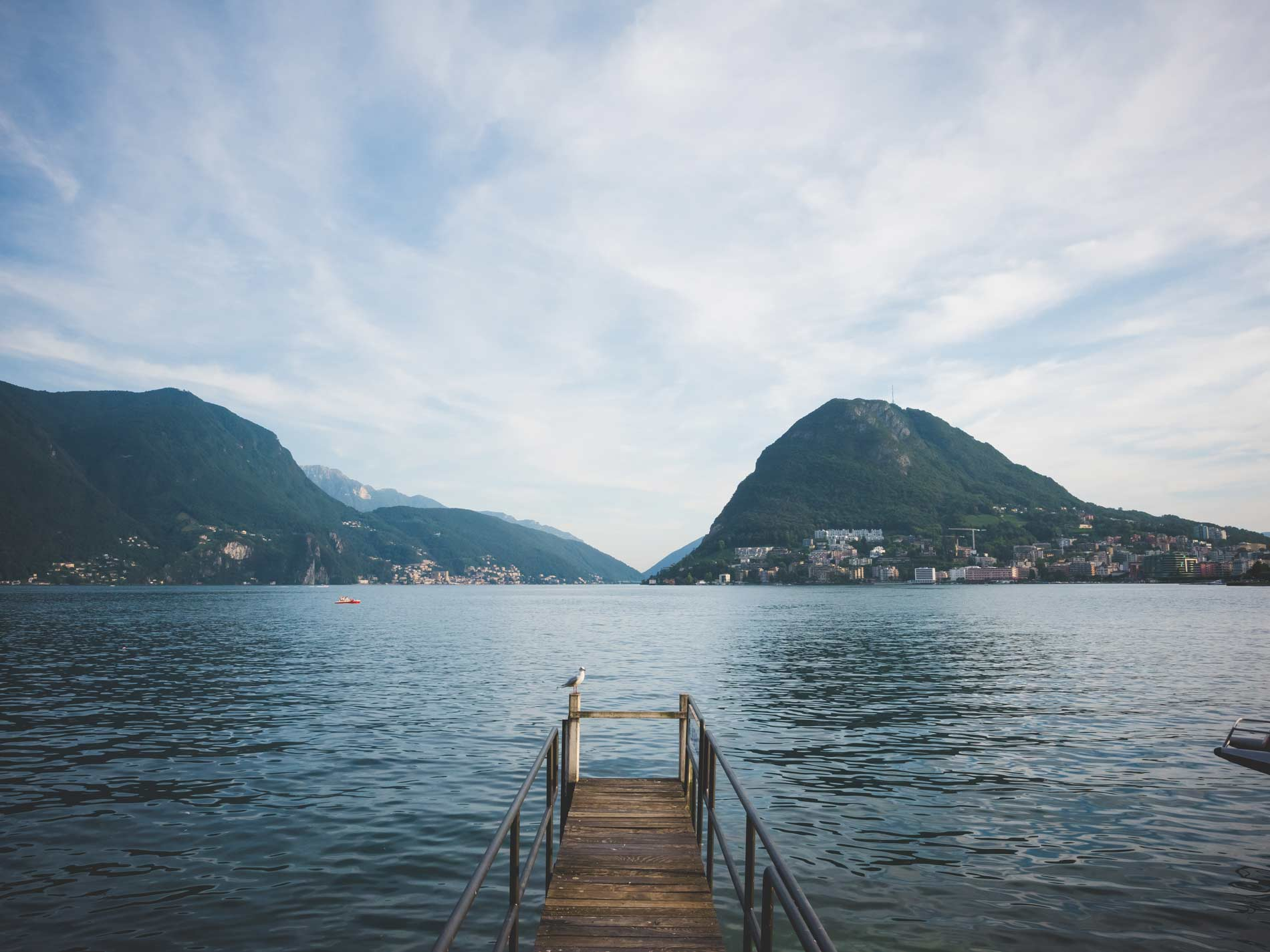 wooden-pier-lake-lugano-switzerland-2024-10-22-07-12-22-utc