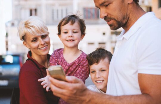 young-family-with-two-small-children-standing-outd-2024-10-20-02-55-07-utc