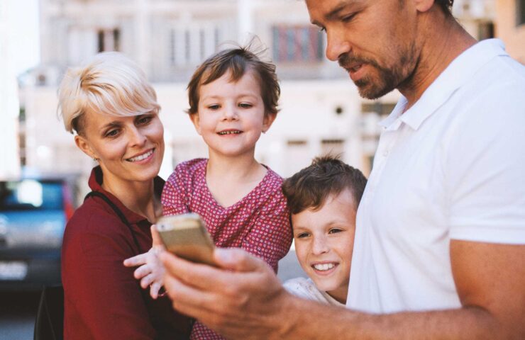young-family-with-two-small-children-standing-outd-2024-10-20-02-55-07-utc