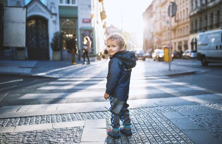 a-small-toddler-boy-standing-by-a-road-outdoors-in-2024-10-20-08-54-54-utc