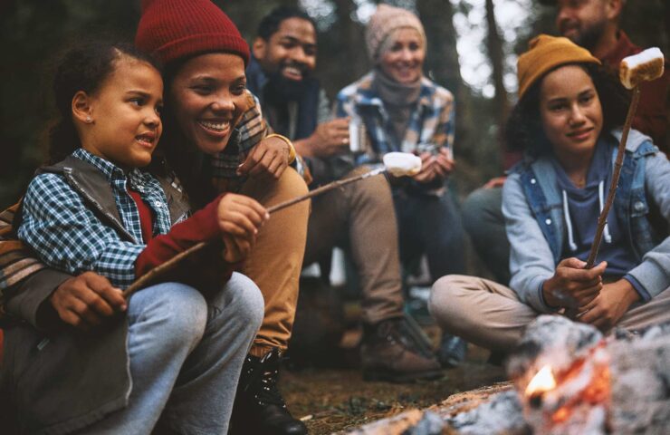 happy-black-mother-and-kids-roasting-marshmallows-2024-12-13-18-17-26-utc_01