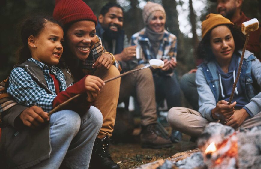 happy-black-mother-and-kids-roasting-marshmallows-2024-12-13-18-17-26-utc_01