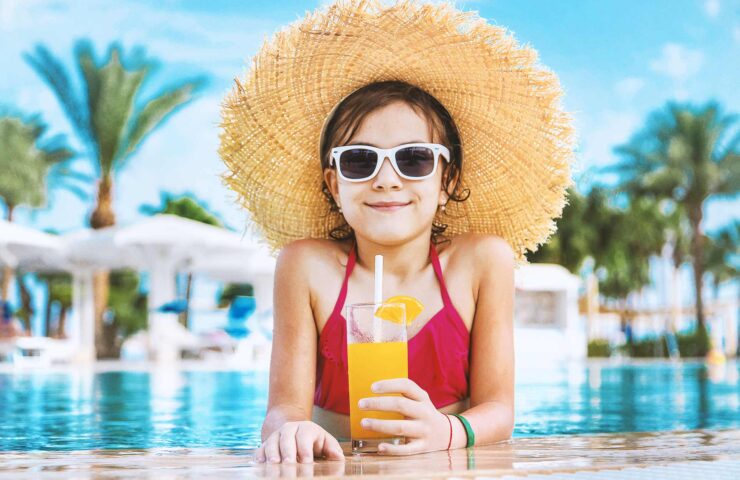 the-child-is-drinking-a-cocktail-by-the-pool-sele-2024-12-19-15-03-34-utc-(1)