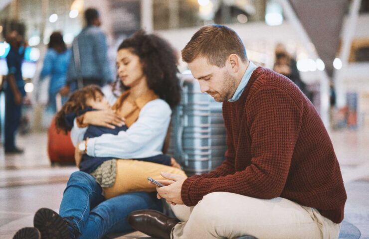 phone-tired-and-interracial-family-waiting-at-the-2026-01-09-11-49-57-utc-(1)